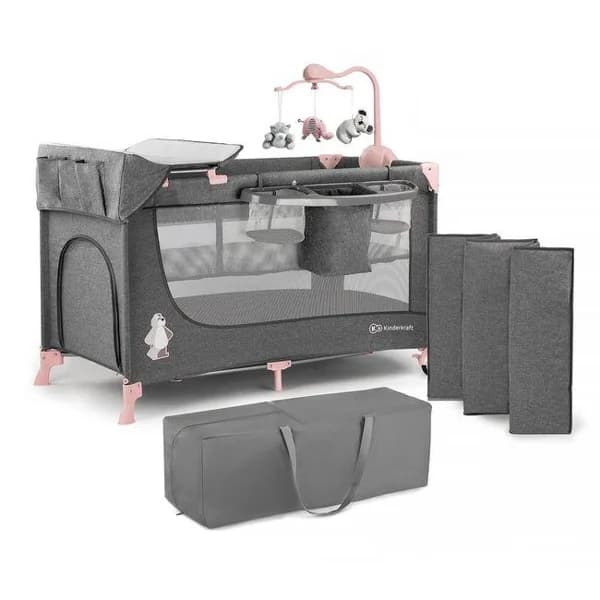 Cuna de viaje Joy Plus gris rosa KINDERKRAFT Dispone de doble altura, doble entrada lateral con cremallera y ruedas para su traslado. Incluye carrusel, cambiador y estante para pañales y bolsillos para objetos. Normativa Europea EN716 - 71 ud - Imagen del producto en Findit